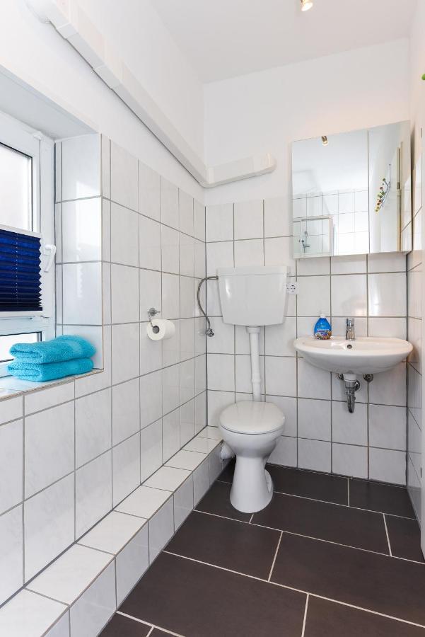 Ferienwohnungen Im Haus Waterkant Neuharlingersiel Buitenkant foto
